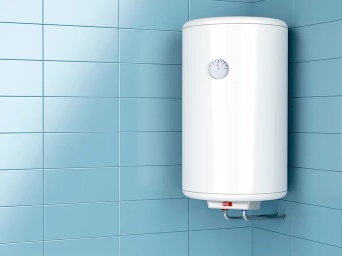 White wall-mounted water heater with pressure gauge, showcased by Kazar’s Electric for efficient installation services.