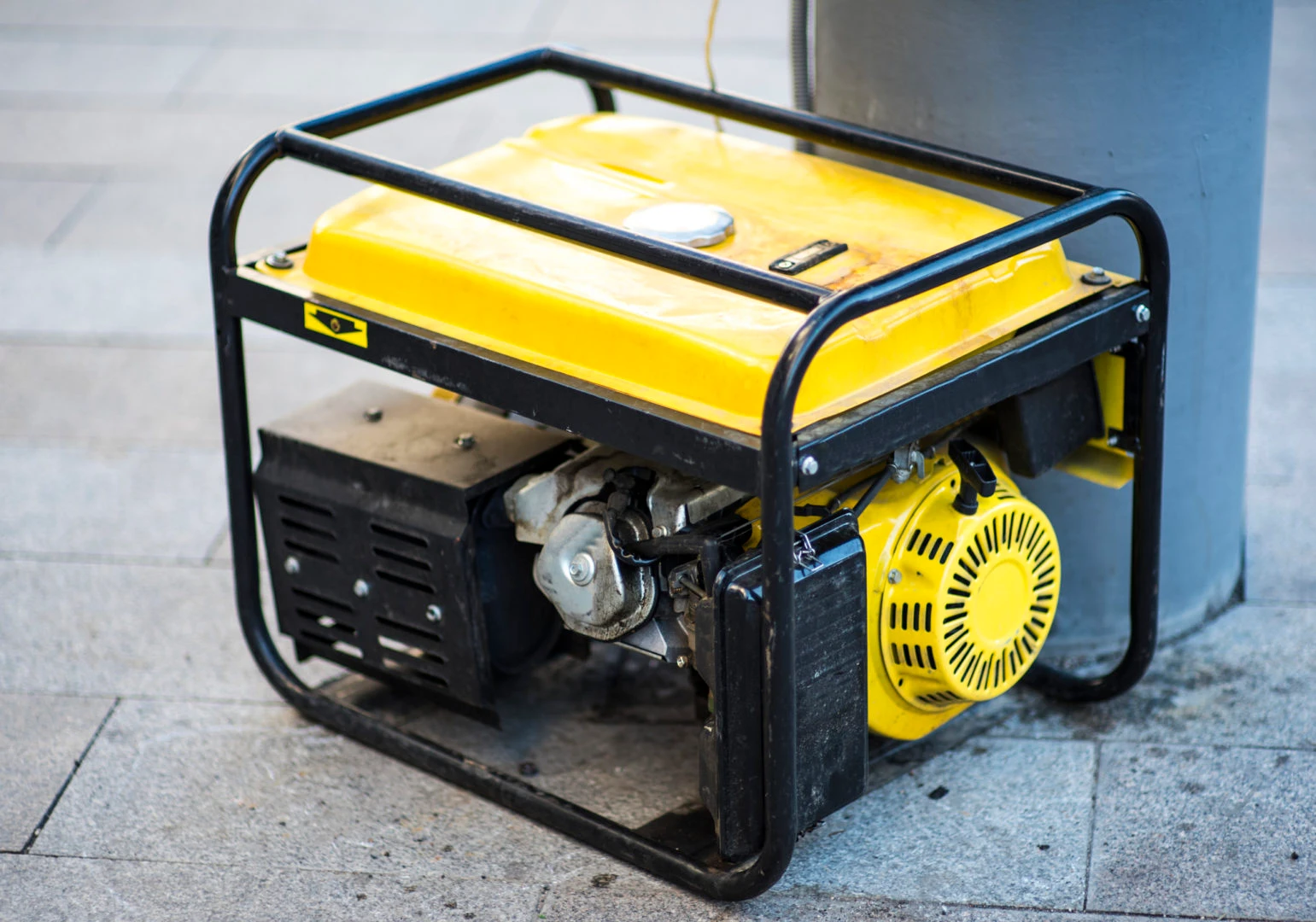 Portable generator in yellow and black, designed for safe connections by Kazar's Electric.